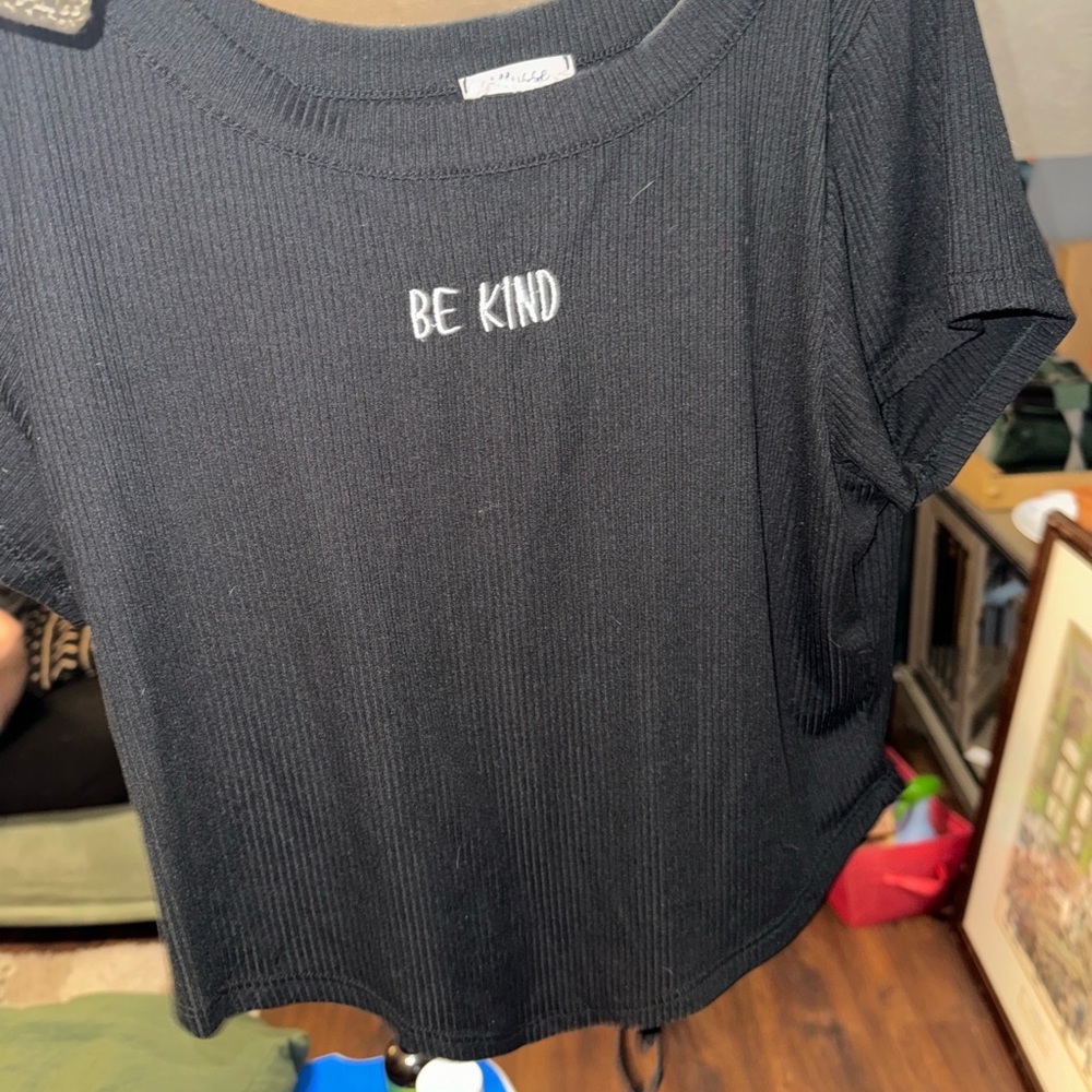All shirts $5 purses $20